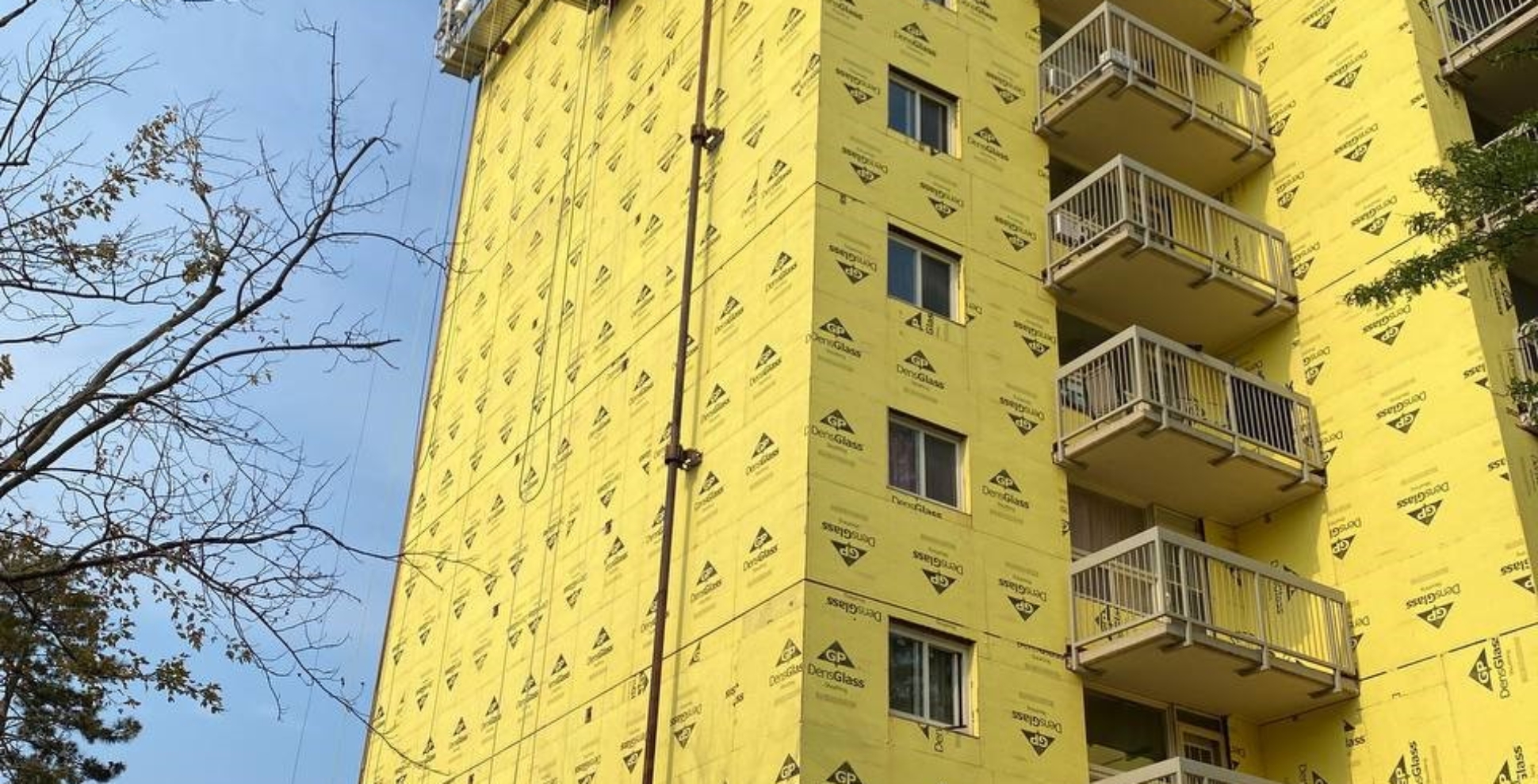 Building completely sheathed with Densglass